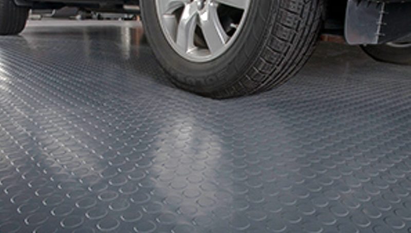 Heavy duty rubber top garage floor mats